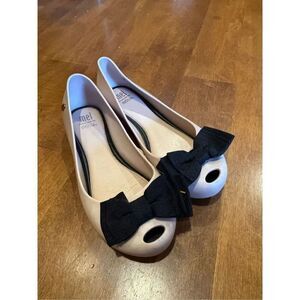 Little girl size one Melissa flats size one
